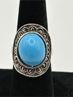 Silver-Tone Ring with Bright Blue Oval Cabochon